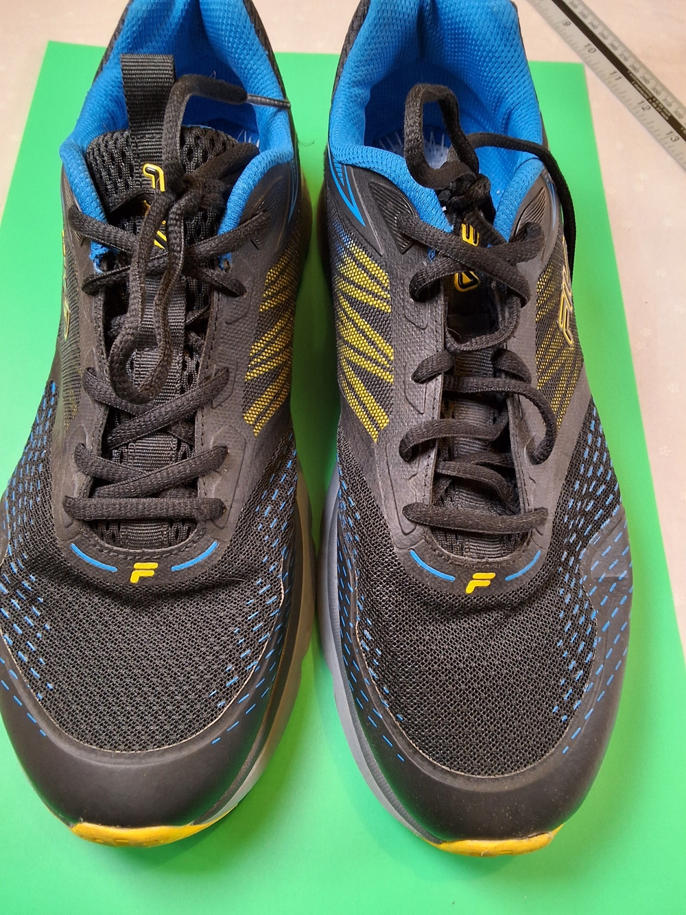 Fila Men's Black Athletic Shoes with Blue and Yellow Accents